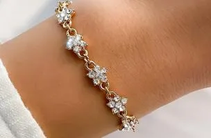 Elegante bracciale con pietre artificiali, colore oro