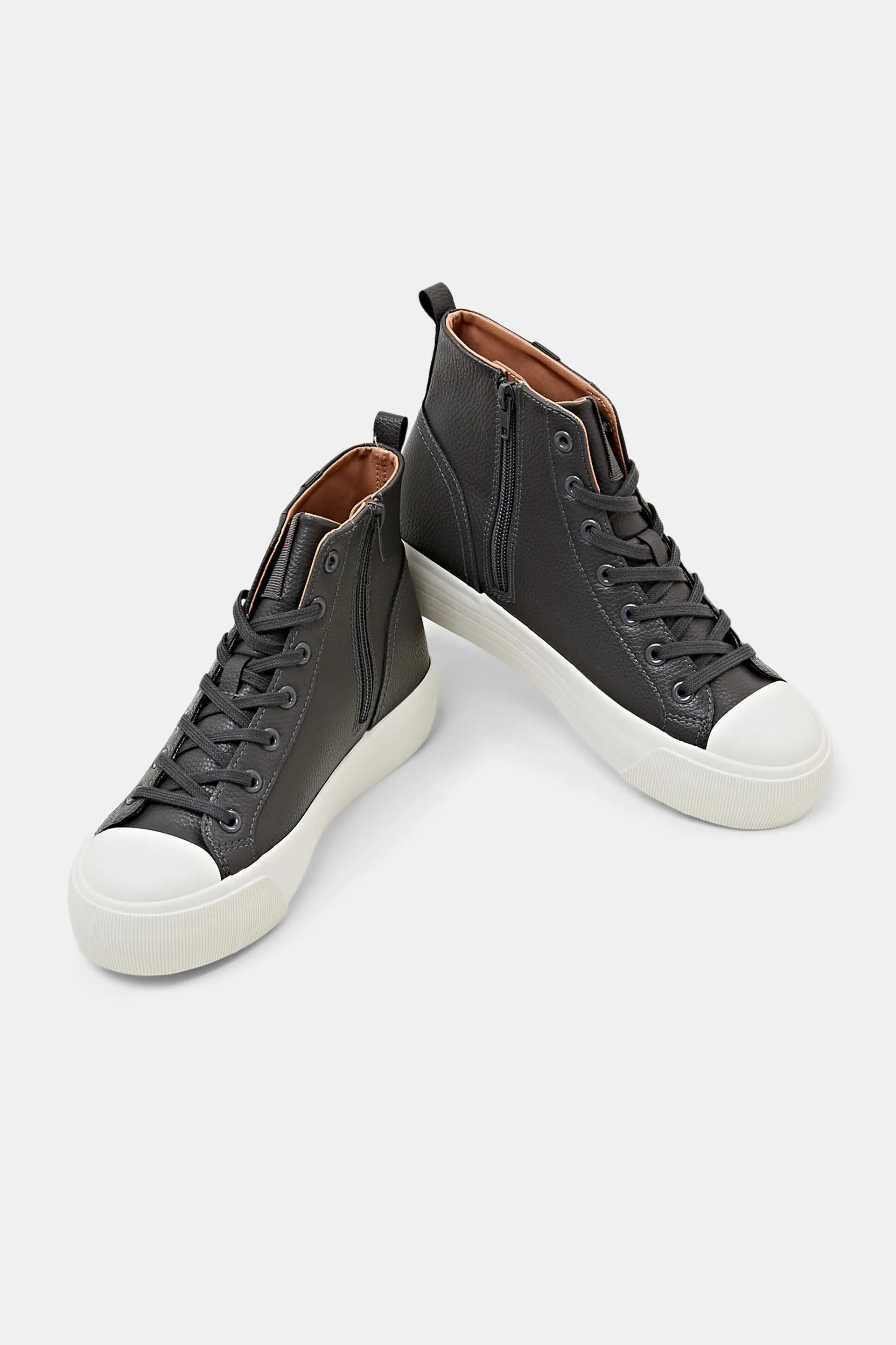 Sneakers con plateau in similpelle